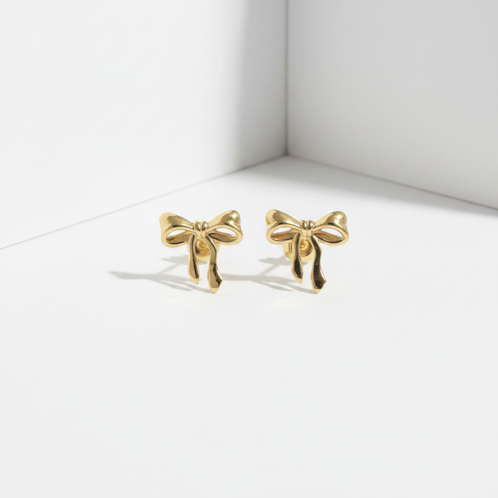 Gold bow stud earrings with ribbon design